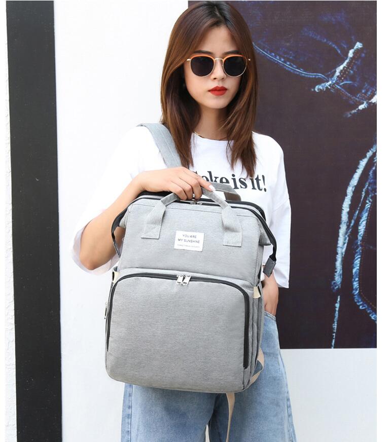 Mochila de pa&ntilde;ales de beb&eacute; gris